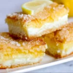 Delicious Lemon Cream Cheese Bars with a creamy topping and vibrant lemon zest