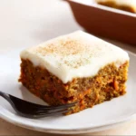 Delicious carrot cake bars topped with cream cheese frosting