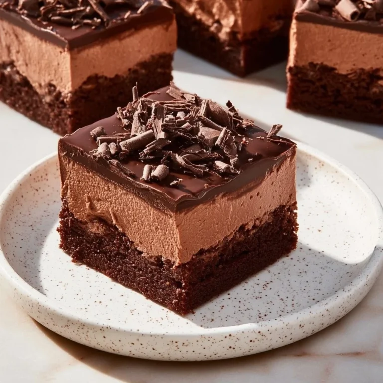 Delicious Chocolate Mousse Brownies topped with rich chocolate ganache